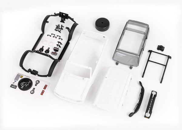 TRAXXAS Body, Ford Bronco, complete (unassembled) (white, requires painting) (includes grille, side mirrors, door handles, fender flares, windshield wipers, spare tire mount, & clipless mounting) - - Traxxas