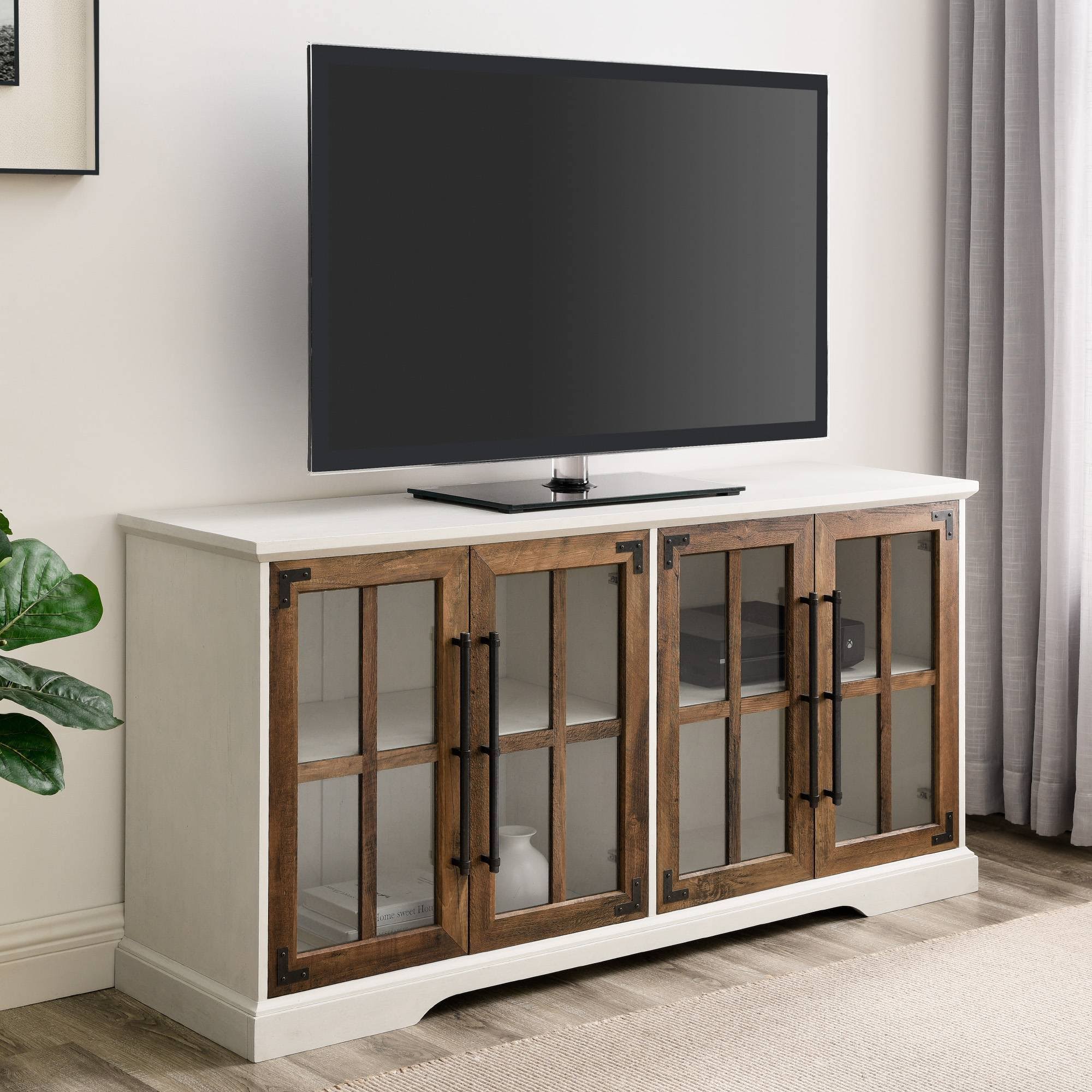 Avalene Modern Farmhouse 4 Door Glass Window Pane Tv Stand For Tvs Up To 65 Brushed White/Rustic Oak - Saracina Home CQ_NOHBWSVG Avalene Modern Farmhouse 4 Door Glass Window Pane Tv Stand For Tvs Up To 65 Brushed White/Rustic Oak - Saracina Home CQ_NOHBWSVG